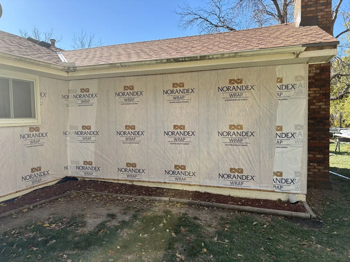 Weather-resistant barrier installed ahead of the new siding
